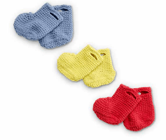 Close-up of baby bootie with strap